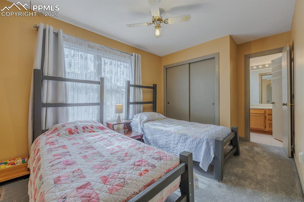 Second bedroom on upper level. Jack and jill bath serves both bedrooms