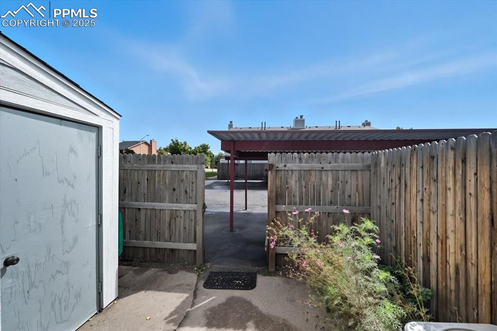 View of fenced backyard