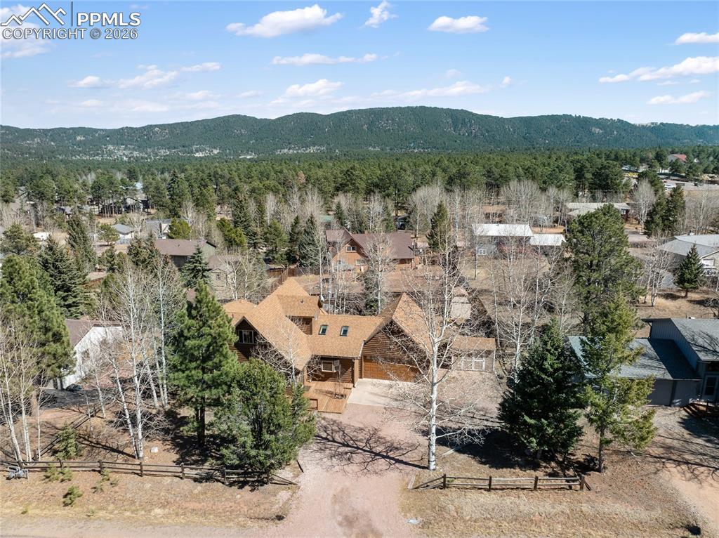 Located in one of the best family friendly neighborhoods in Woodland Park, flat driveway