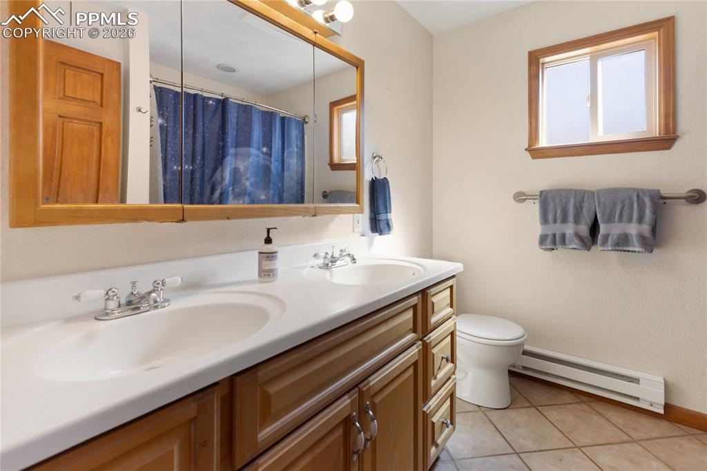 Second level full bath, double vanity's