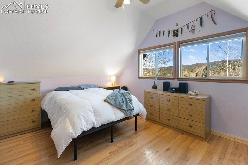 Second level bedroom, hard wood floors, vaulted ceilings, large windows, let the mountain breeze in
