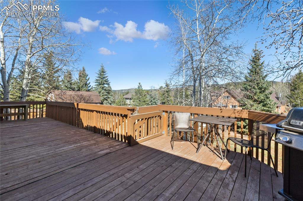Fire up the grill kick back on this huge deck while watching the dogs and kids play in the safely fenced in yard.