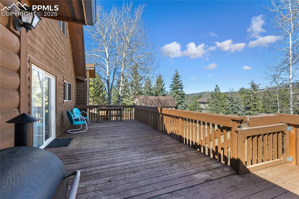 Fire up the grill kick back on this huge deck while watching the dogs and kids play in the safely fenced in yard.