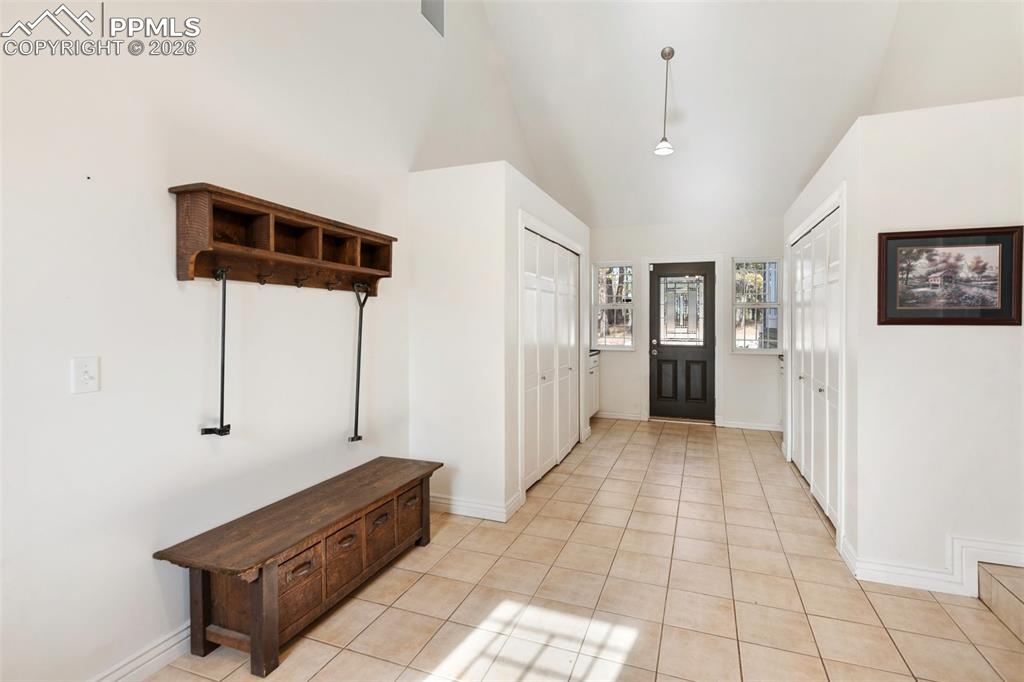 Laundry and mud room, entry from outside. 