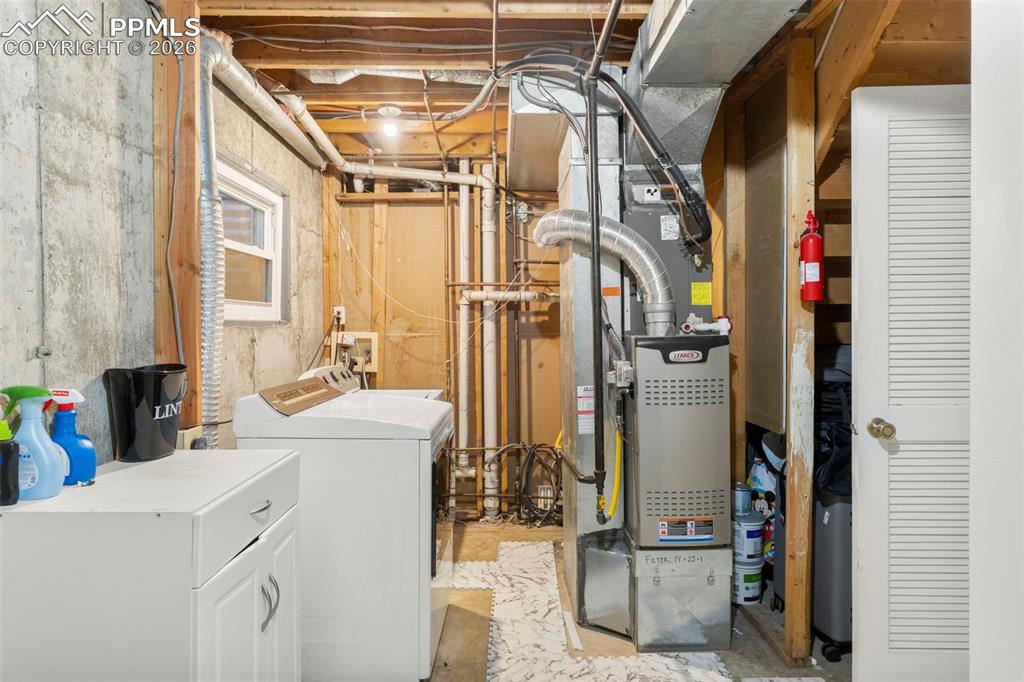 utility room with laundry