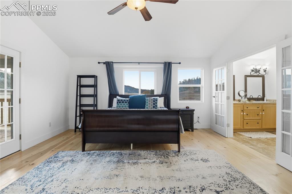 Upper Primary Suite with 5 PC Bath and Walk-out to Large Covered Deck