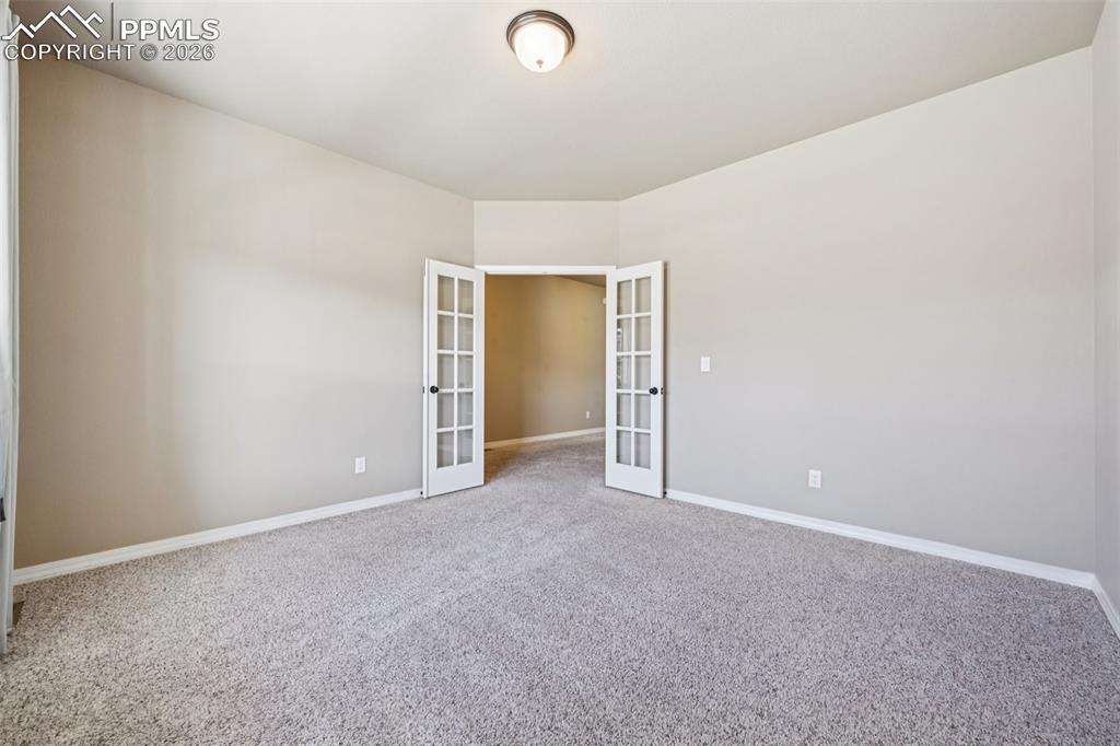 French Doors from the office to the foyer...lots of great wall space!