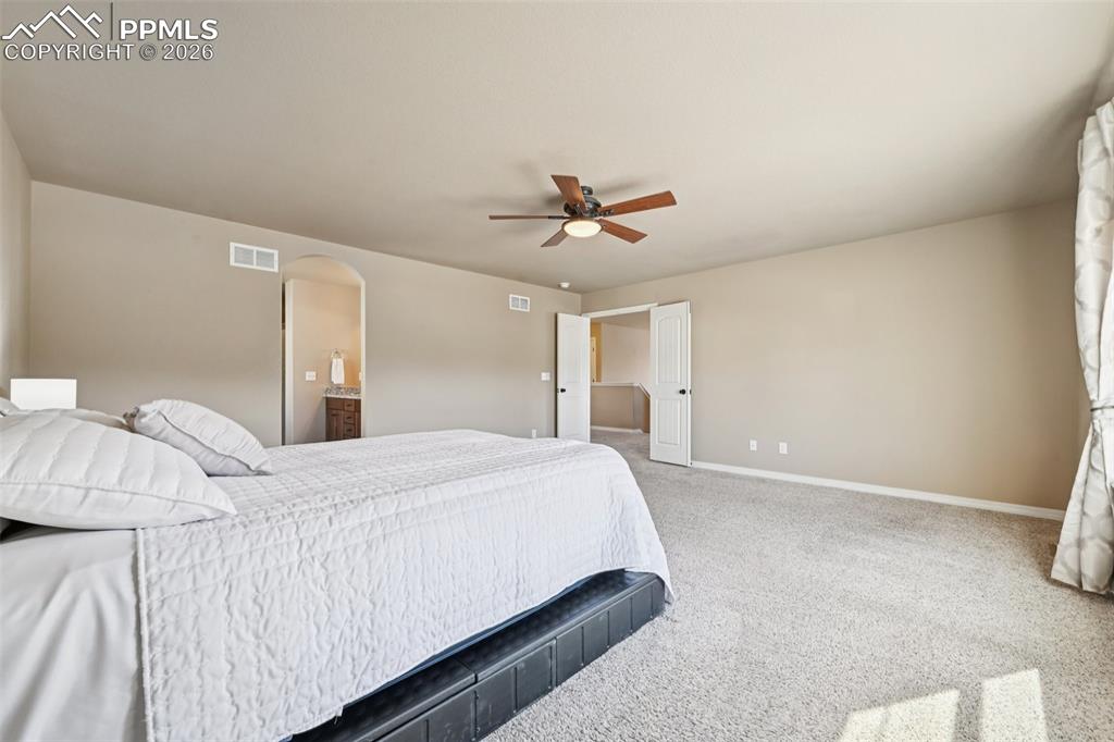 Oversized bedroom with large sitting area
