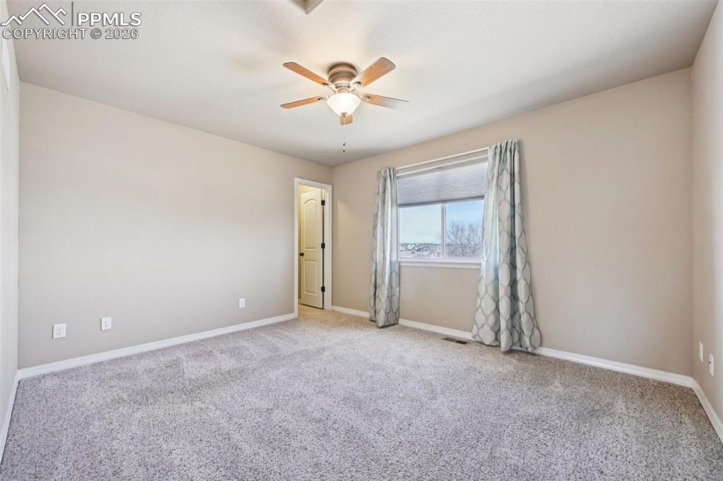 Bedroom #2 upstairs with walk in closet