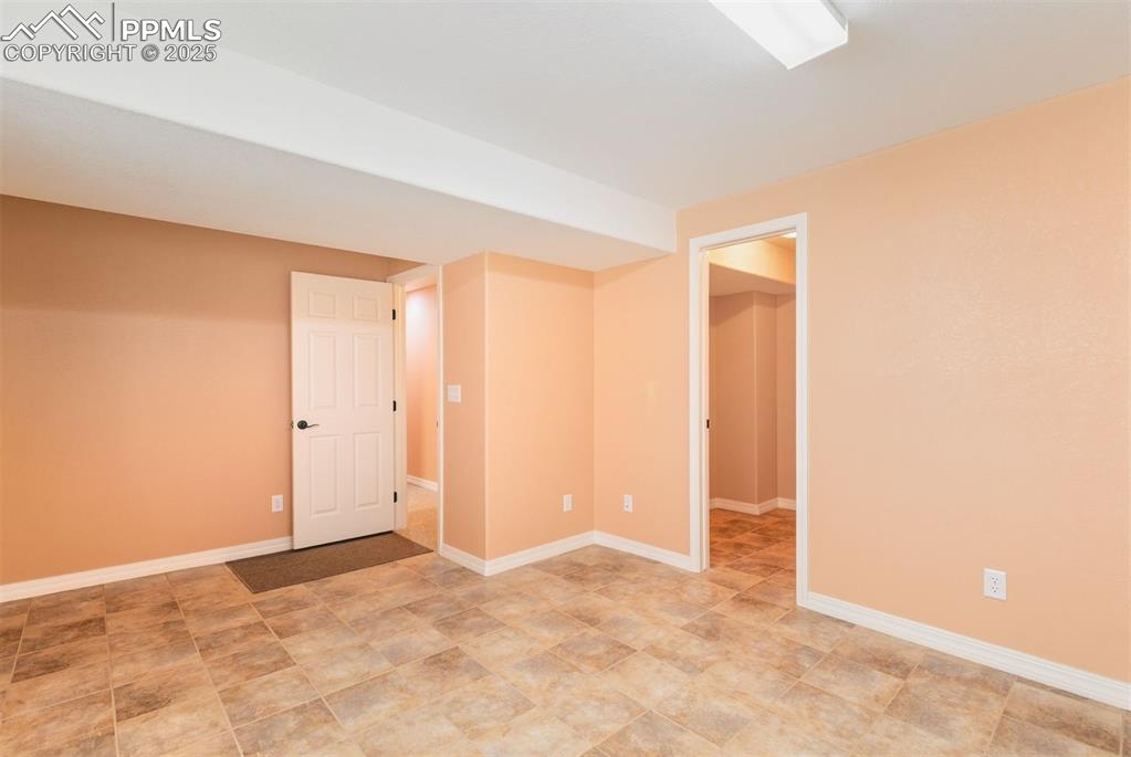 Lower level bedroom could be a great office or craft space