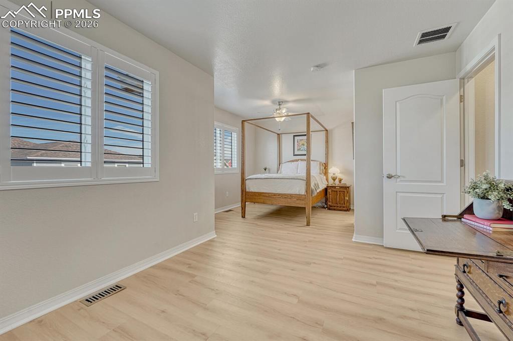Primary bedroom with sitting area