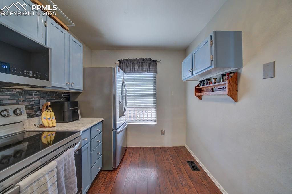Kitchen window that brings in lots of natural light.