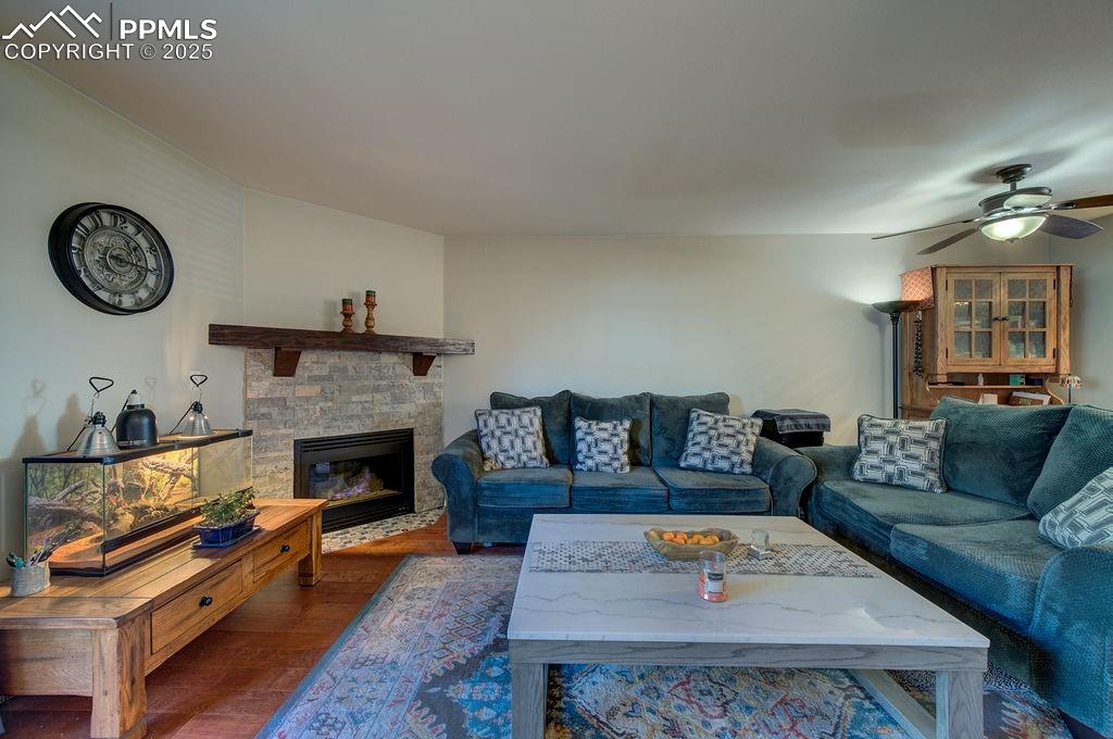 The Living Room has a gas fireplace with stone surround to cozy up on chilly nights.