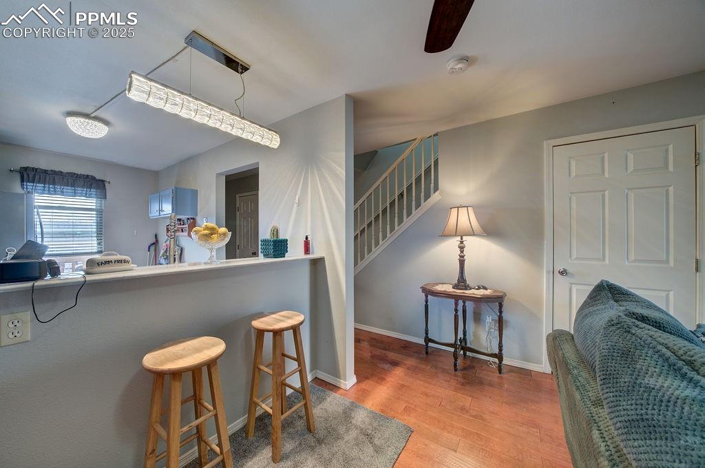 Dining Area and Kitchen with stairs to the upper level.
