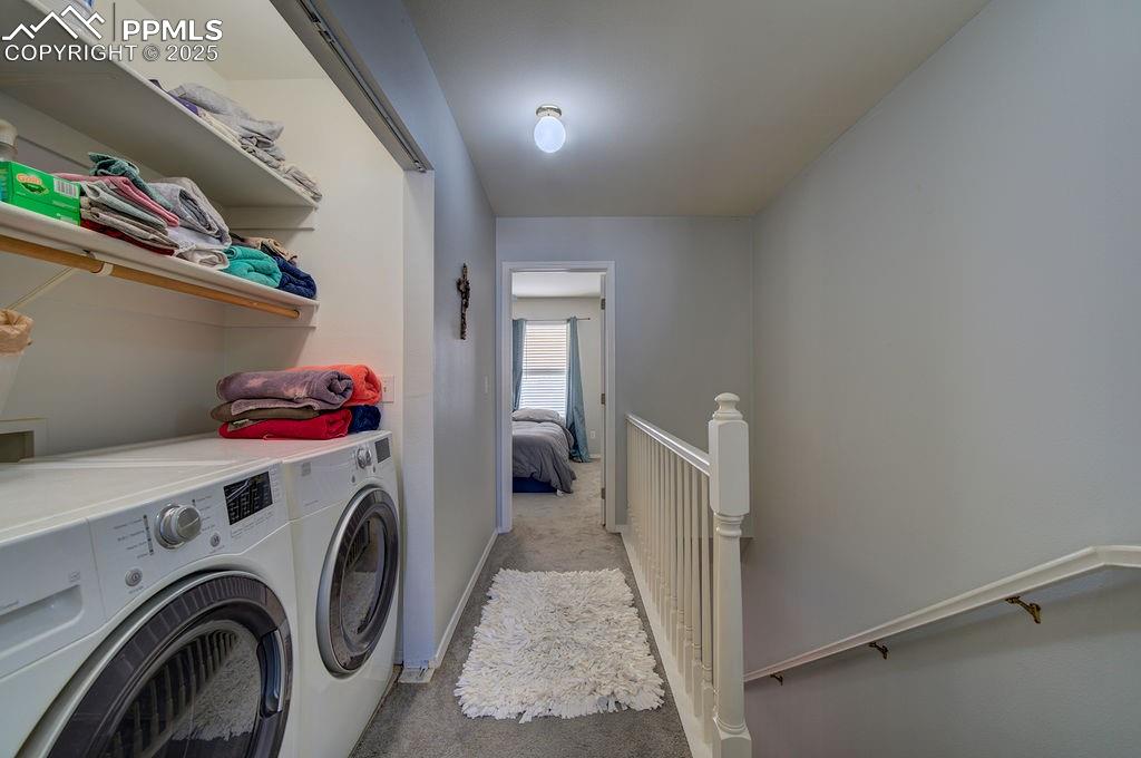 Laundry closet with washer and dryer that stays.