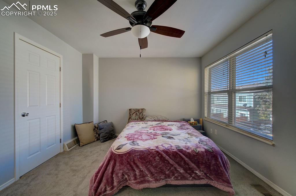Upper level Bedroom #2 with large view window.