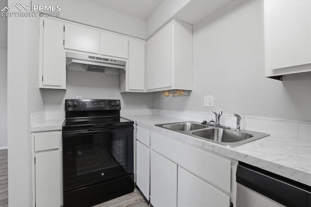 Updated kitchen with new counters and sink.