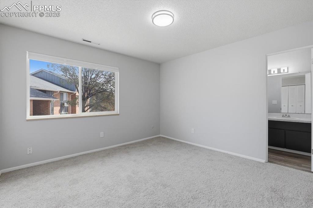 Bedroom with attached bathroom.
