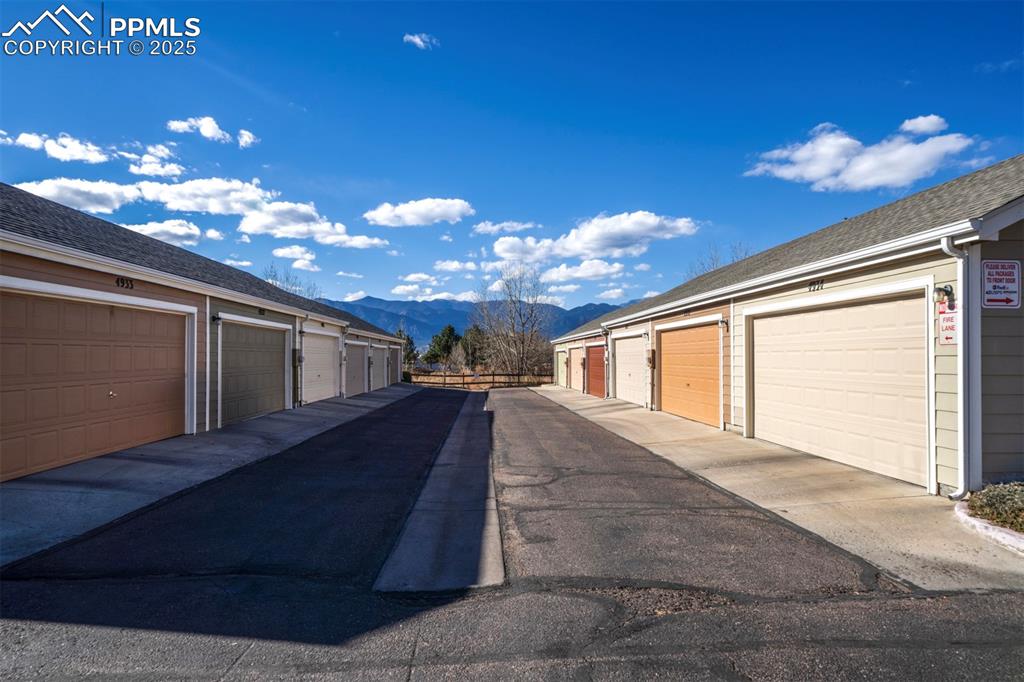 Garage featuring a mountain view