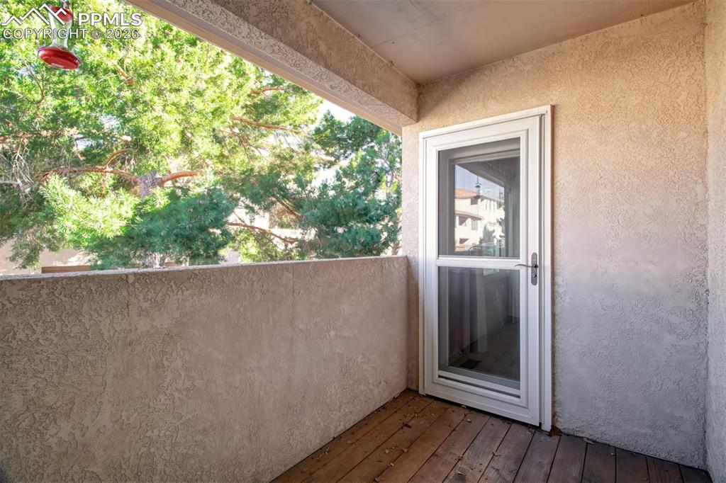 Rear covered patio with access from the master bedroom and the living room. 