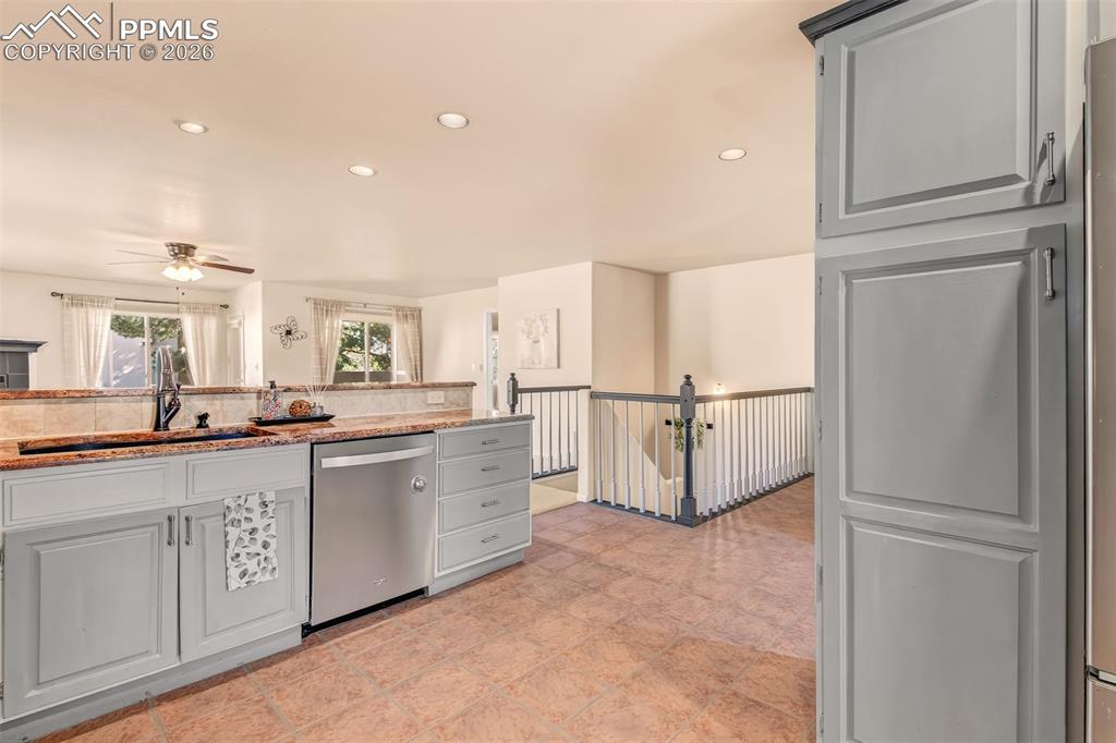 Spacious kitchen with convenient pantry for added storage. 