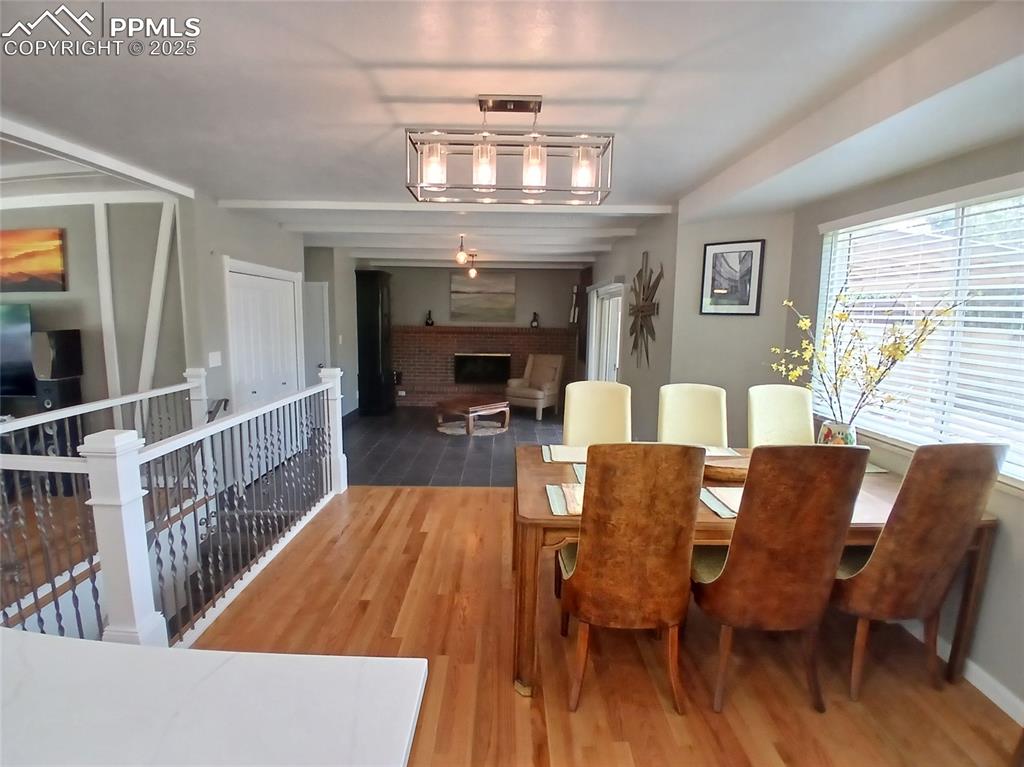 Dining space with hardwood floors.
