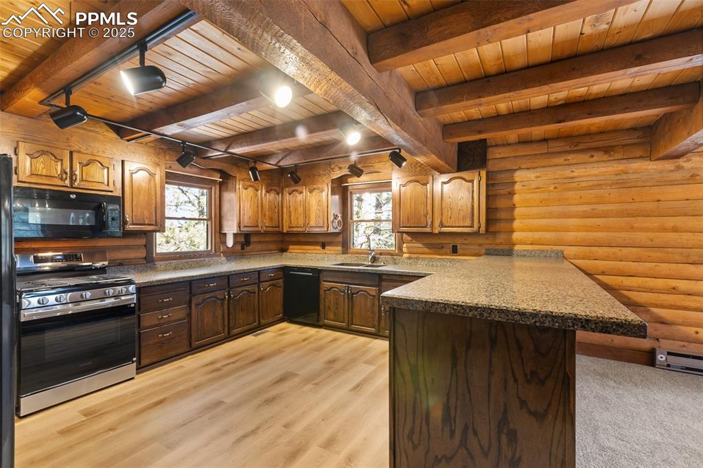 All new LVT flooring, cabinets have been refinished, brand new gas range.