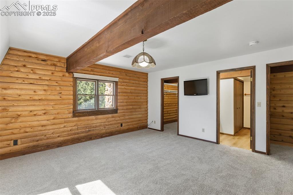 Master bedroom with two walk-in closets, attached bath and laundry. New paint, carpet and LVT.