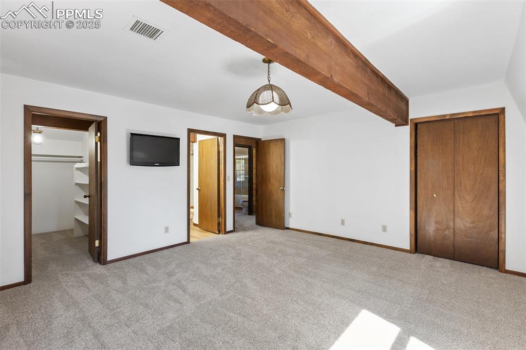 Master bedroom has two walk-in closets and attached bath. 