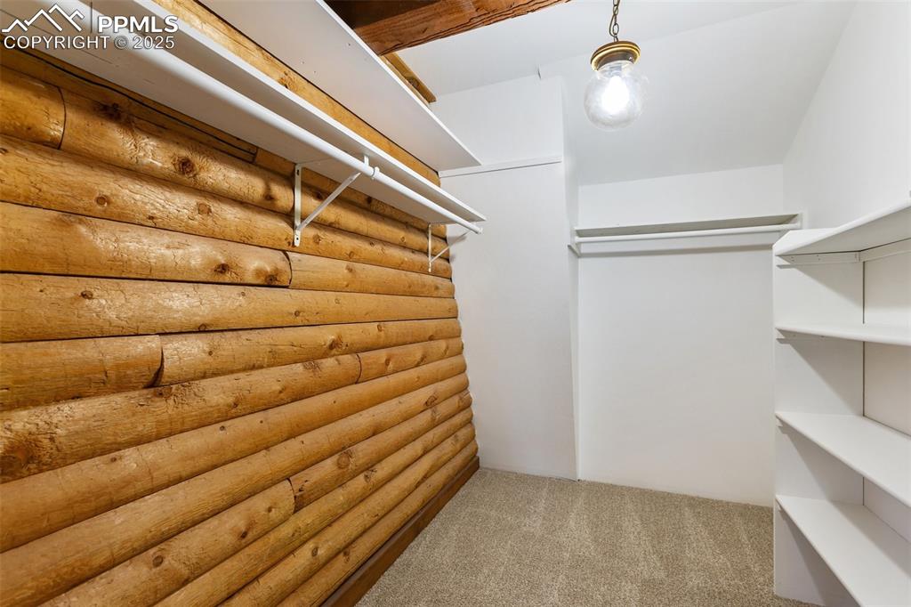 One of two master bedroom closets.