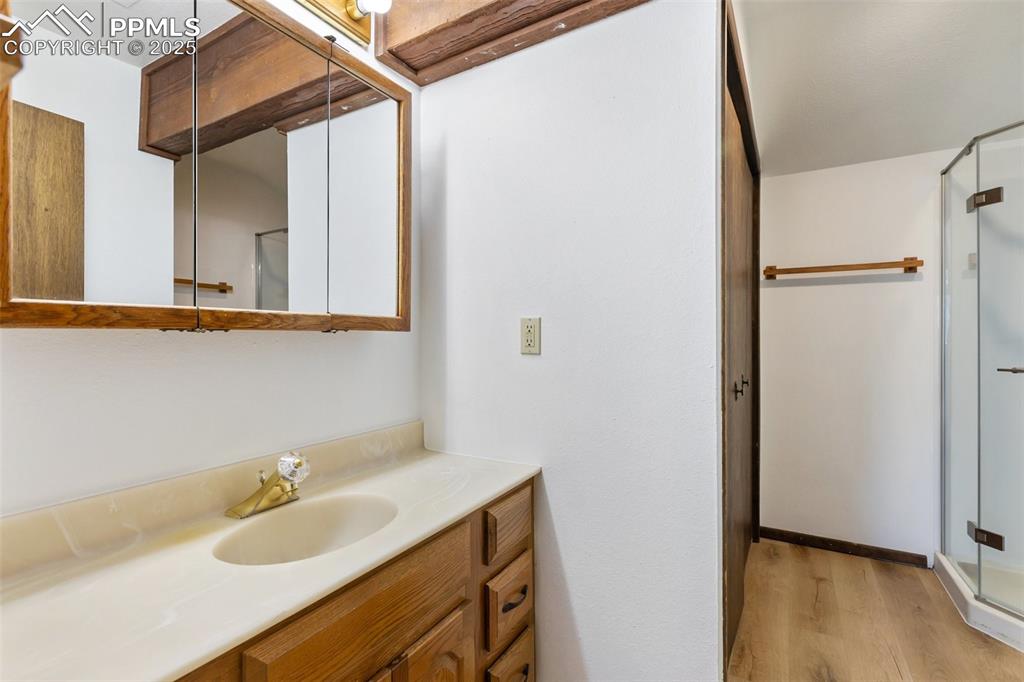 Master bathroom with laundry in closet. New paint and LVT.