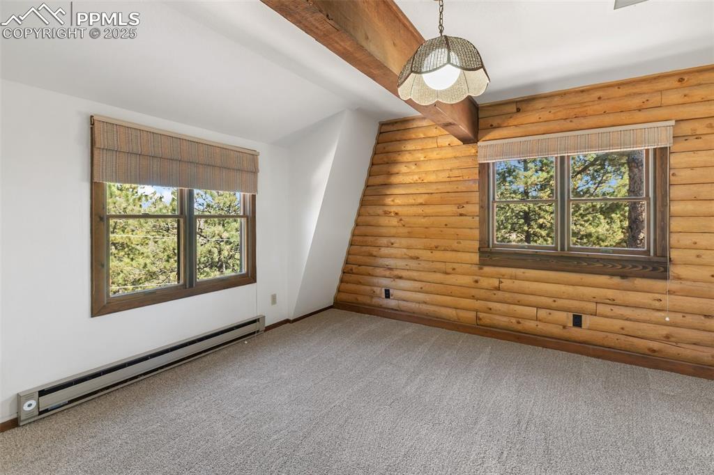 Large second bedroom on upper level.  New paint and carpet.