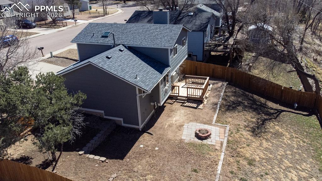 Large fully fenced lot with large treed lot behind. 