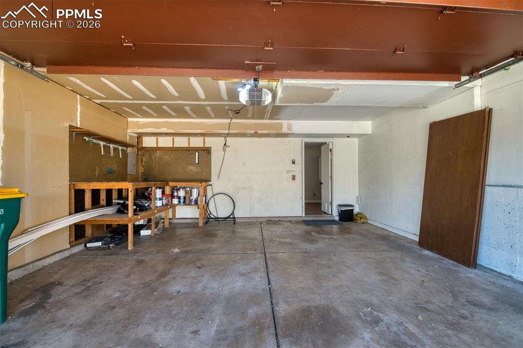 Full size 2 car garage with built-in workbench area. 
