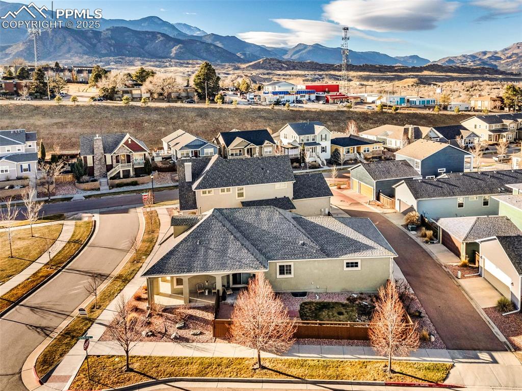 Looking west over the yard, to the mountains and nearby Bear Creek Regional Park. 
