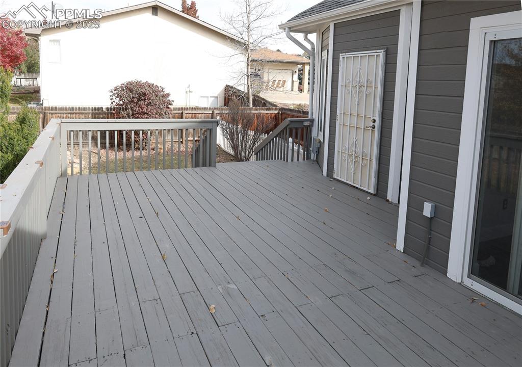 Expansive open deck connecting the walkout kitchen and master suite.