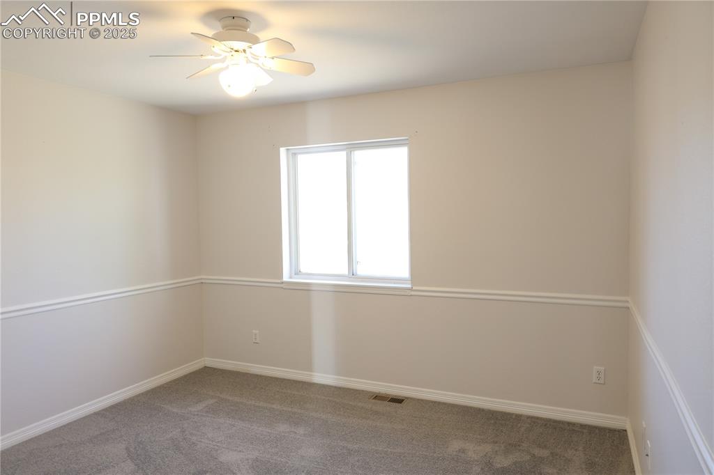 New paint and carpet for the second main level guest bedroom.