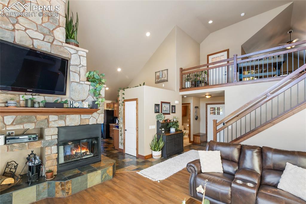 This beautiful river rock 3 sided fireplace makes this home feel so warm and welcoming!
