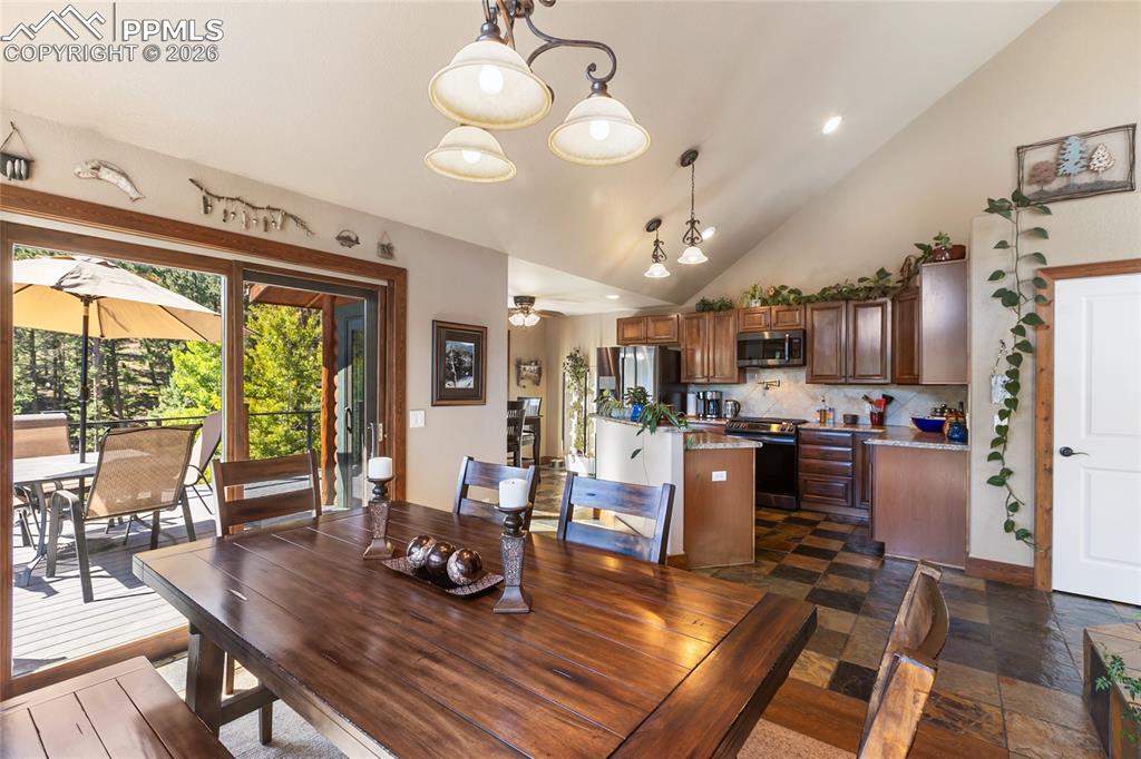 I love this open concept kitchen to dining to outdoor living area!