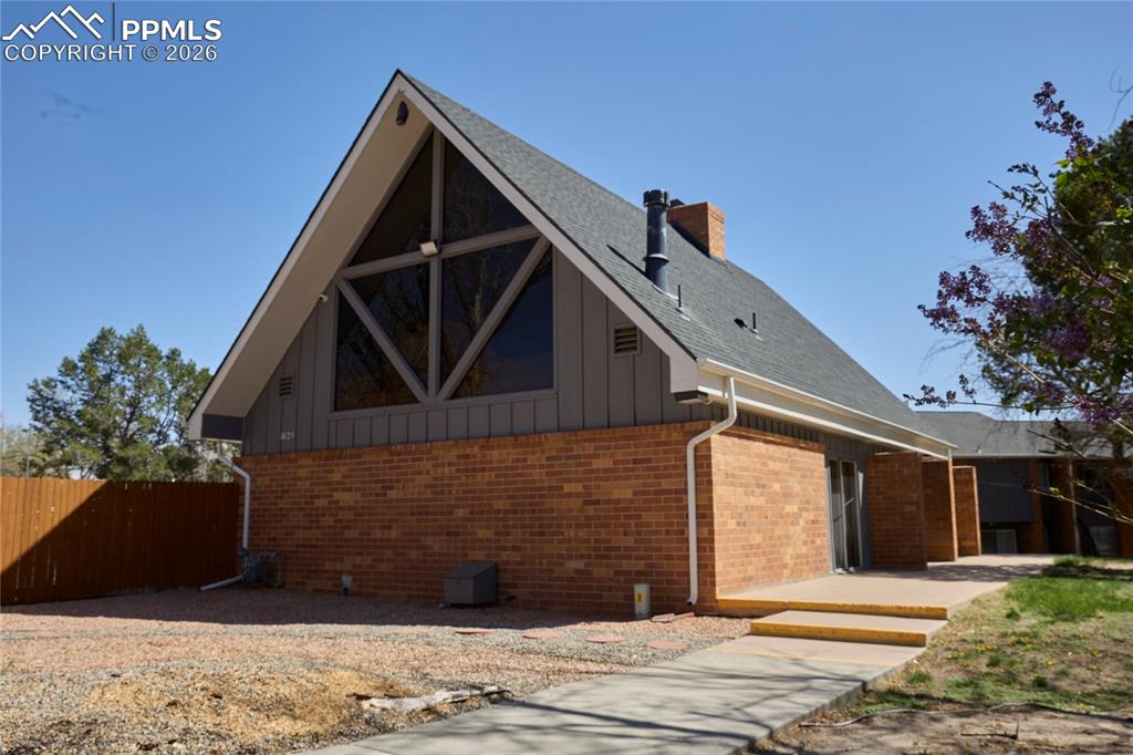 View of swimming pool with a fenced in pool and patio area