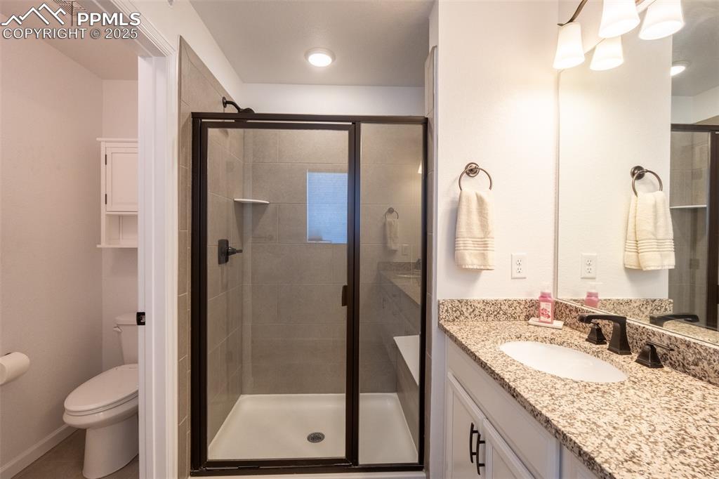 Primary 3/4 bathroom (3) with dual sinks - upper floor