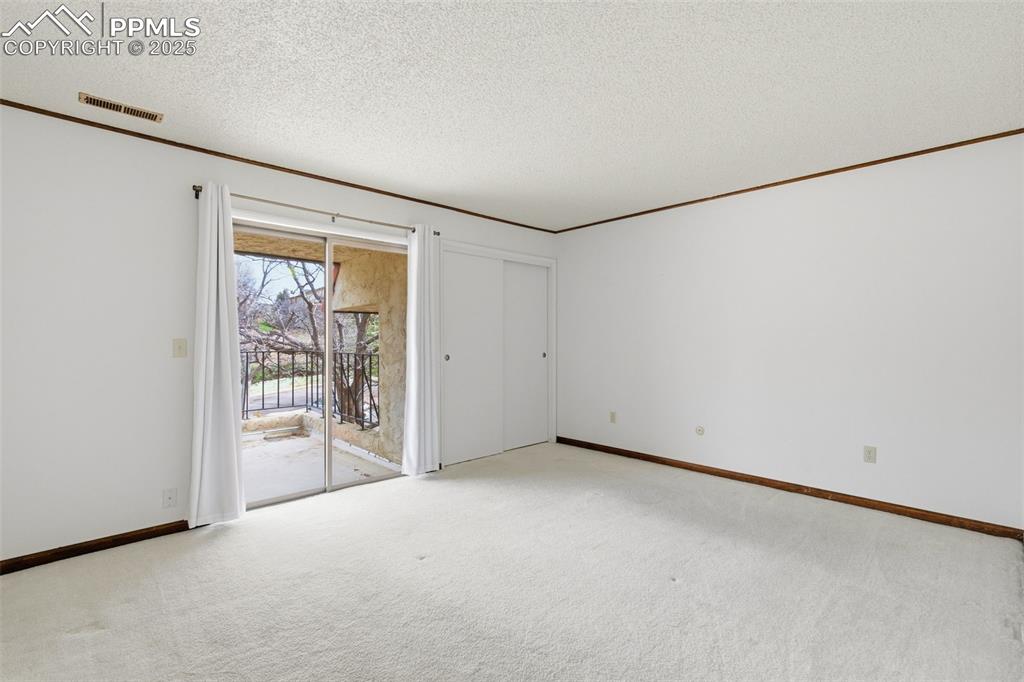 Spare room with door to deck