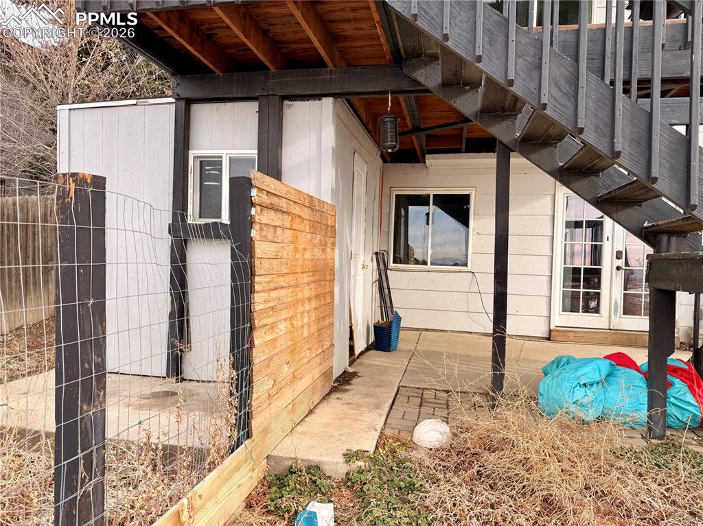 View of side of property featuring a patio area