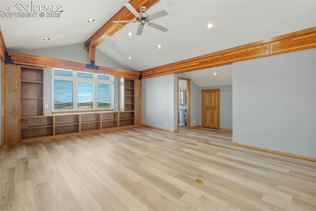 Unfurnished living room with light wood-style floors, a ceiling fan, and recessed lighting