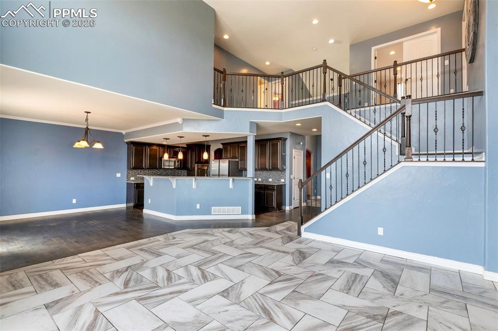 Open main level with striking staircase