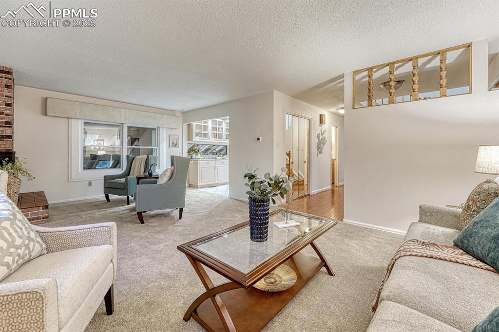 The Living Room has convenient access to the updated Kitchen.