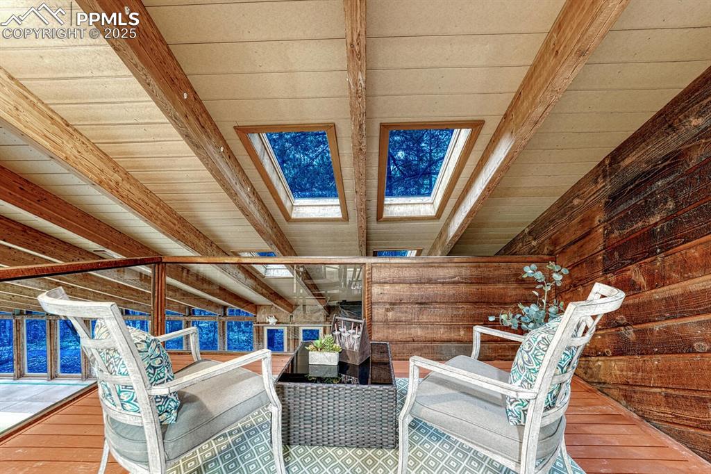 Intimate balcony off the Dining Room overlooking the indoor pool and hot tub with skylights to enjoy the night stars.