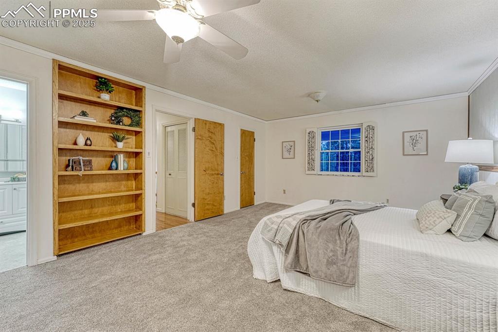 The Primary Bedroom offer built-in bookcases, an adjoining bathroom, and walk in closet.