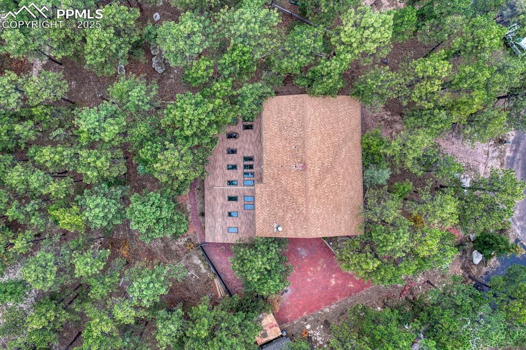 Aerial view of home and lot.