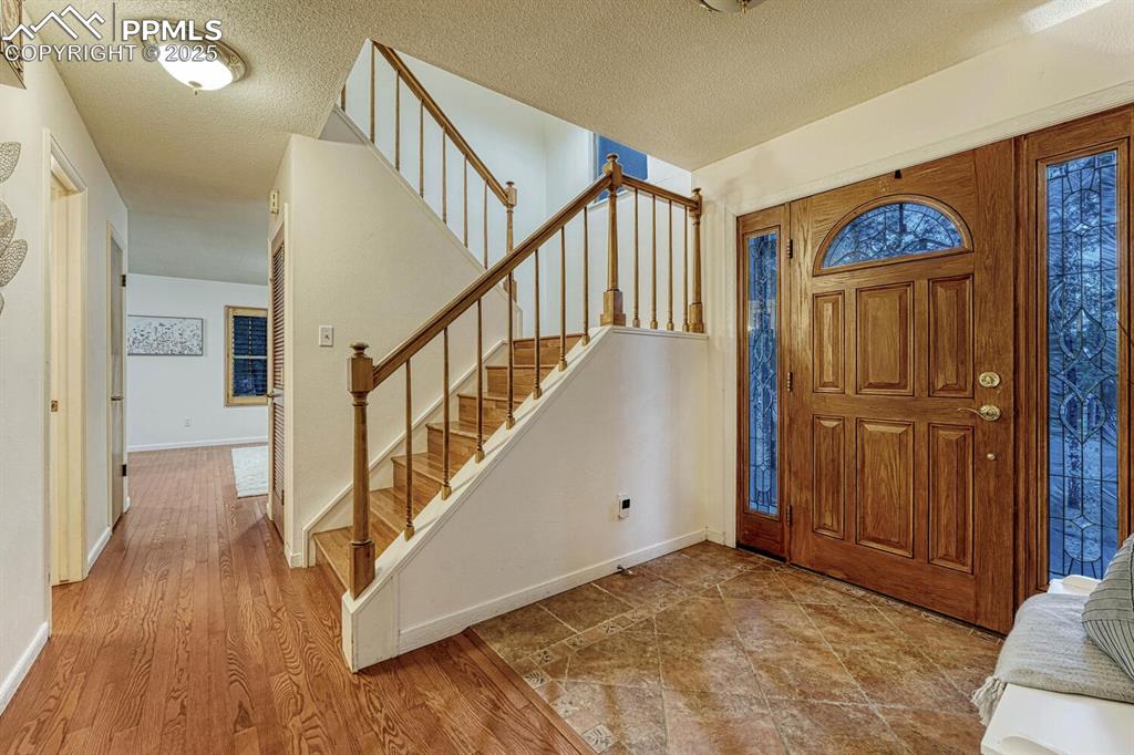 Front Entry with stairs to the upper level.